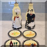 K01. Set of ceramic oil and vinegar carafes with 4 plates. - $16 